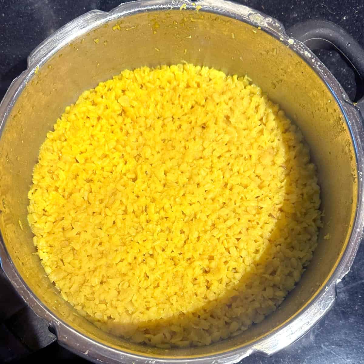 Cooked dal for sambar in pressure cooker.