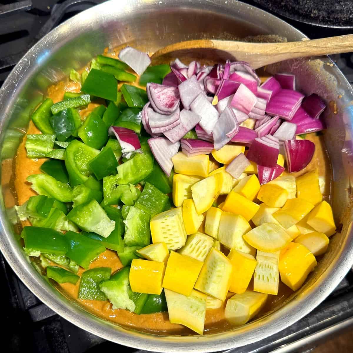 Vegetables added to tikka masala sauce.