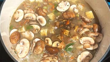 Soy sauce and Cajun spice mix added to soup.
