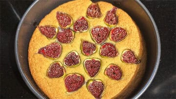 Baked fig and almond cake in springform pan.