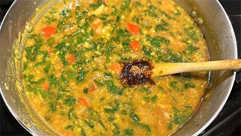 Jaggery and tamarind added to moringa dal.