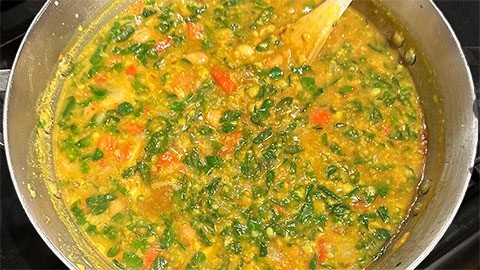 Moringa dal simmering on stove.