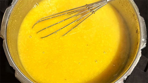 Cooked lentils whisked until creamy.