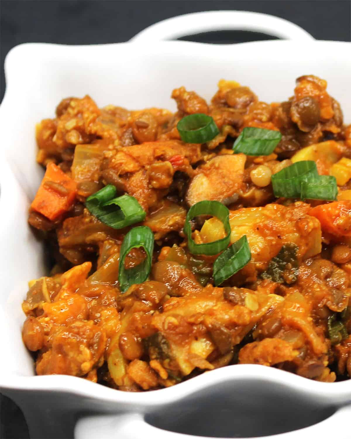 Front close-up view of lentil curry in bowl.