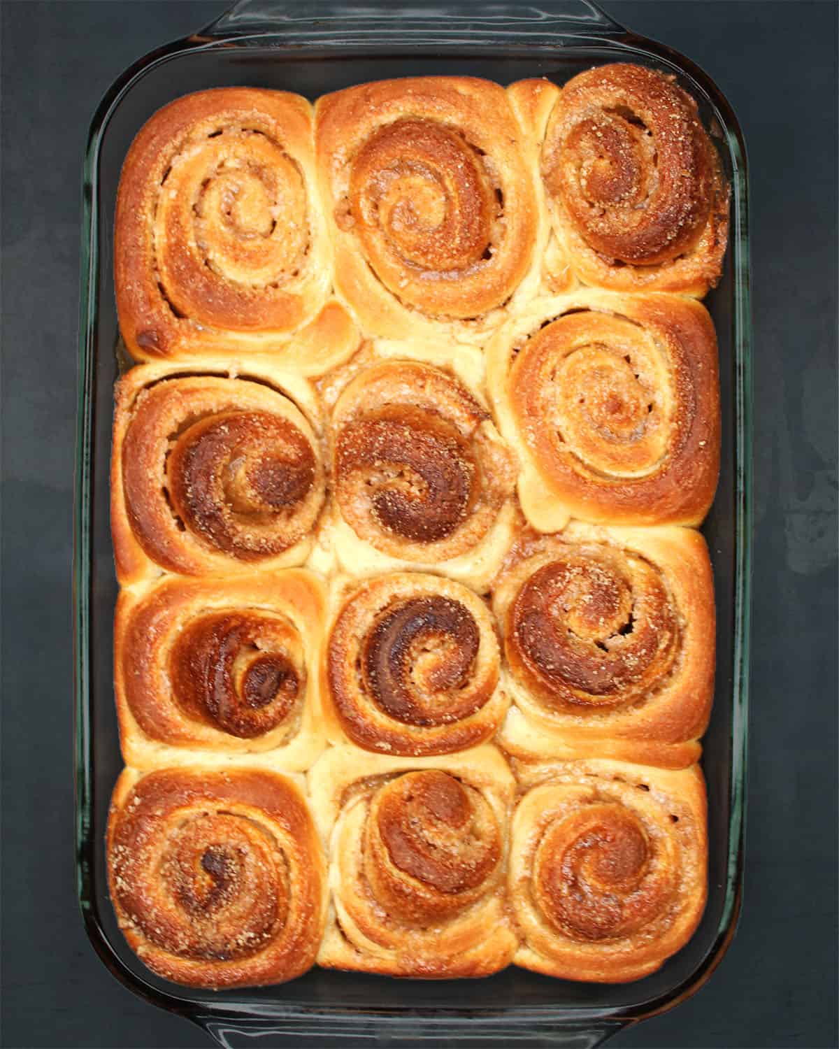 Cinnamon rolls in baking pan.