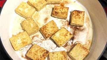 Tofu pan-fried until golden brown.