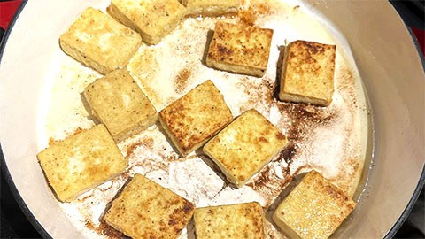 Tofu pan-fried until golden brown.