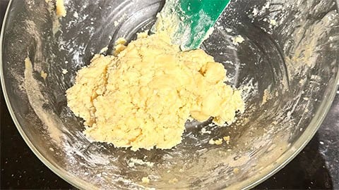 Vanillekipferl cookie dough in bowl.