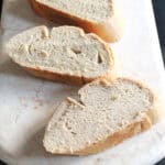 Closeup view of whole wheat French bread slices.