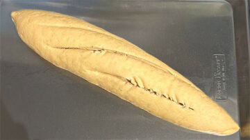 Scored bread loaf.