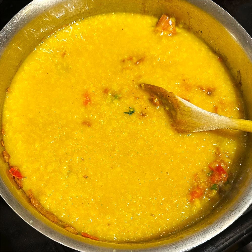 Lentils added to pan.