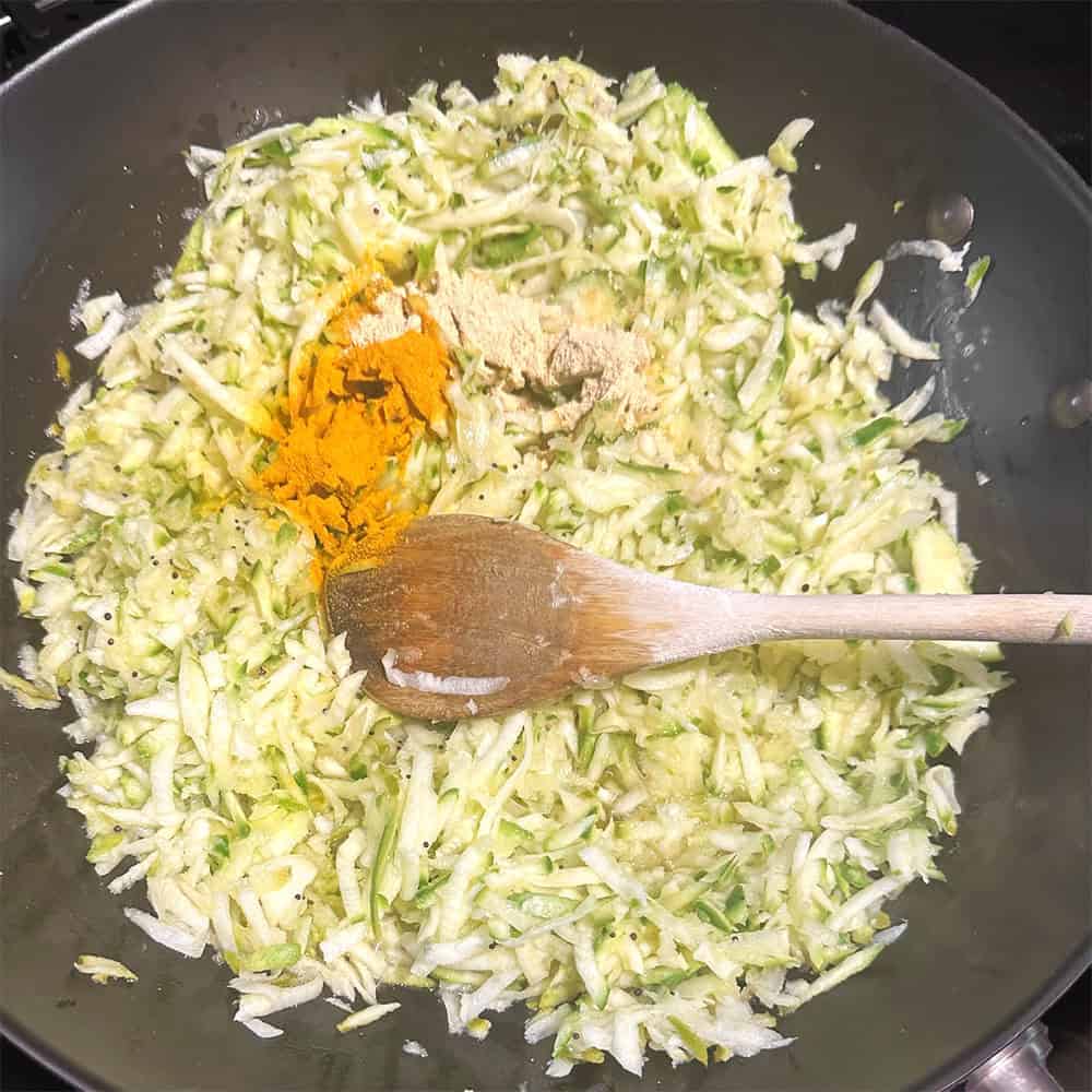 Turmeric and fenugreek added to mangoes.