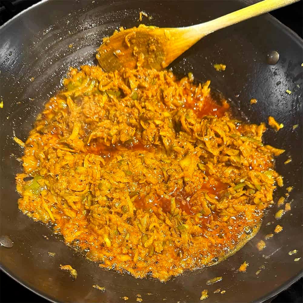 Mango thokku ready in wok.