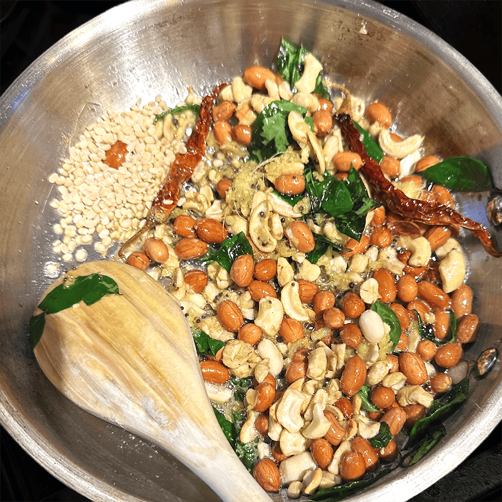 All tadka ingredients added to skillet.