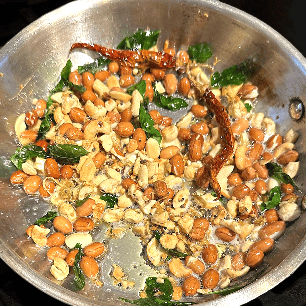 Toasted tempering ingredients in skillet.