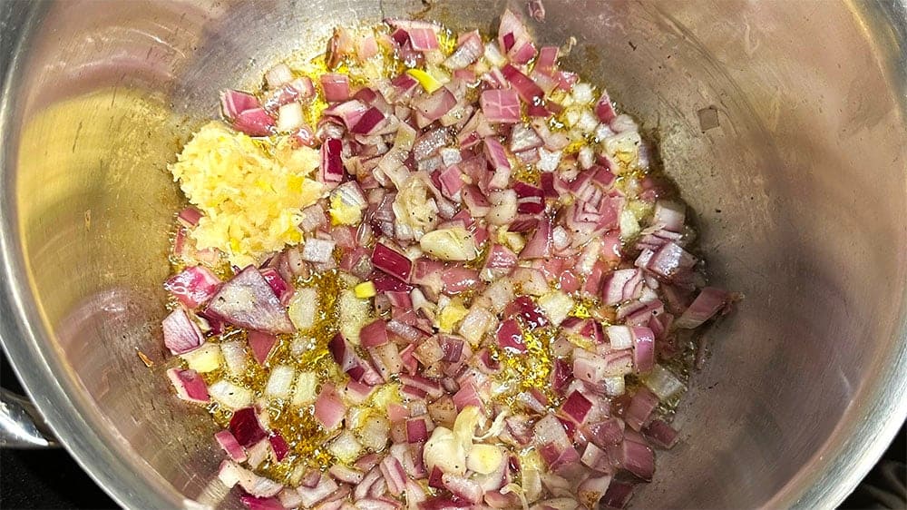Onions and garlic in olive oil for soufiko.