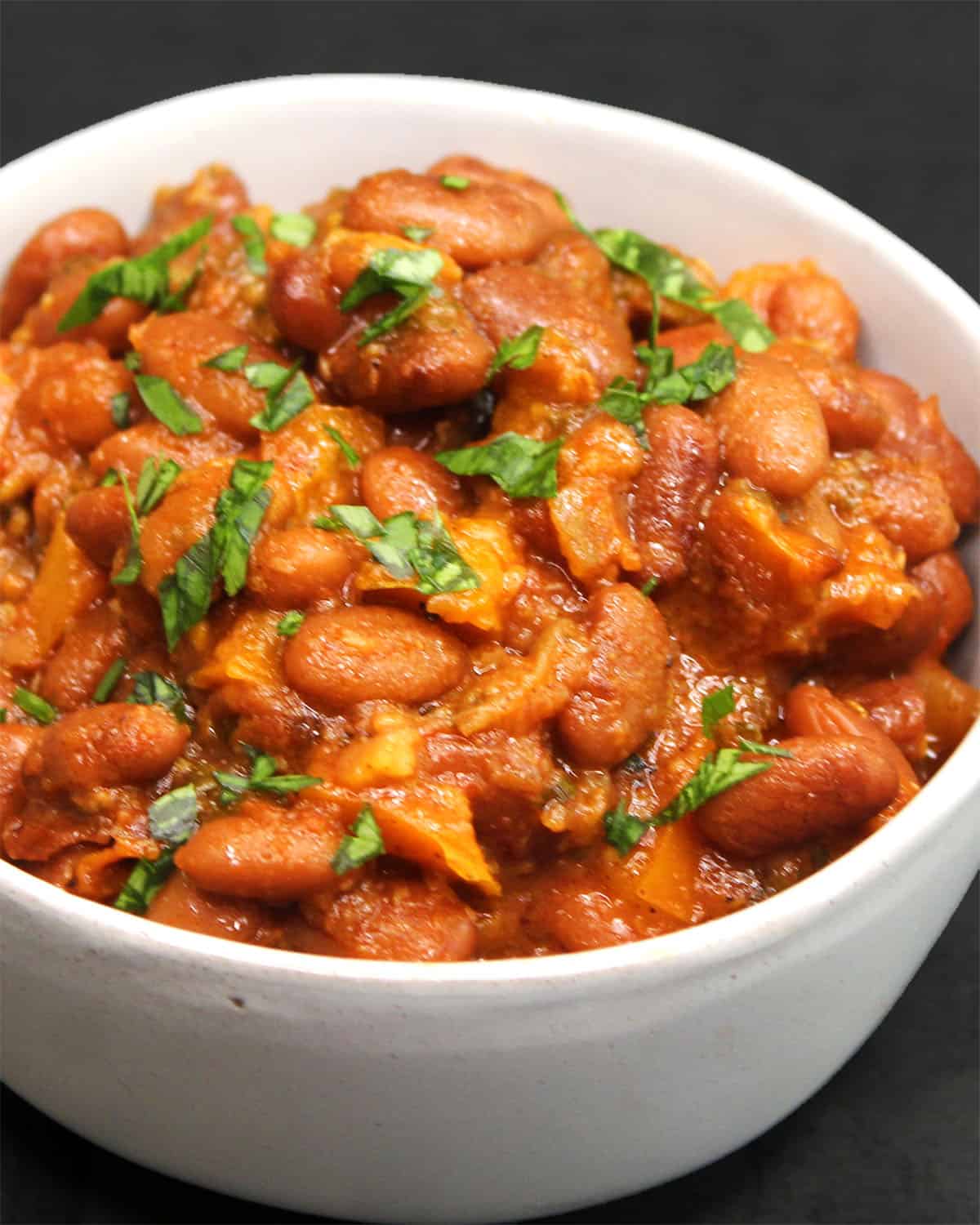 Creamy pinto beans in a bowl.