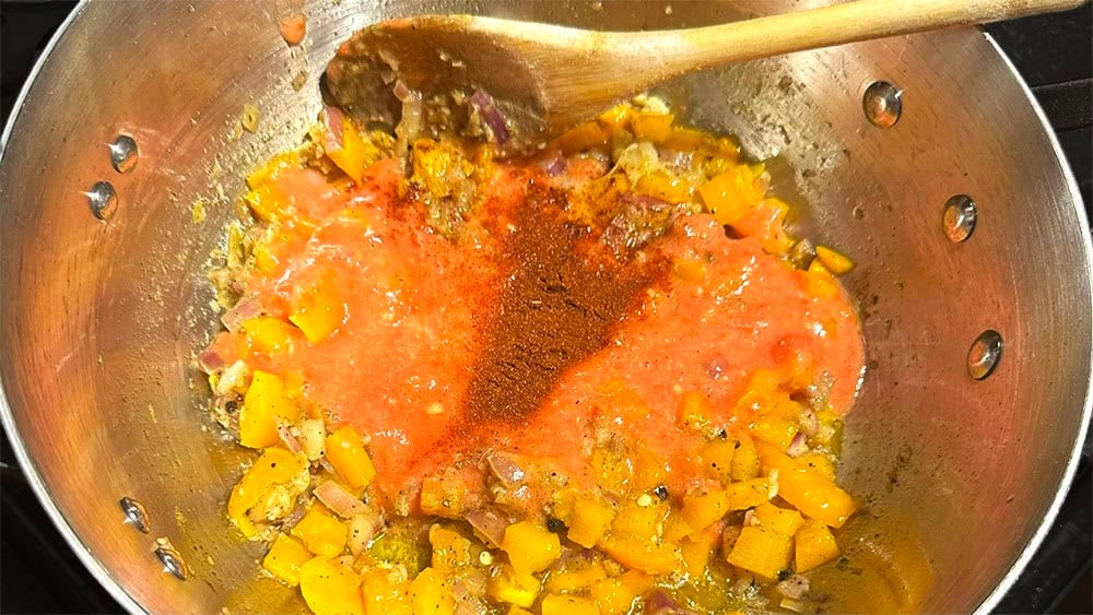 Tomatoes added to pan.