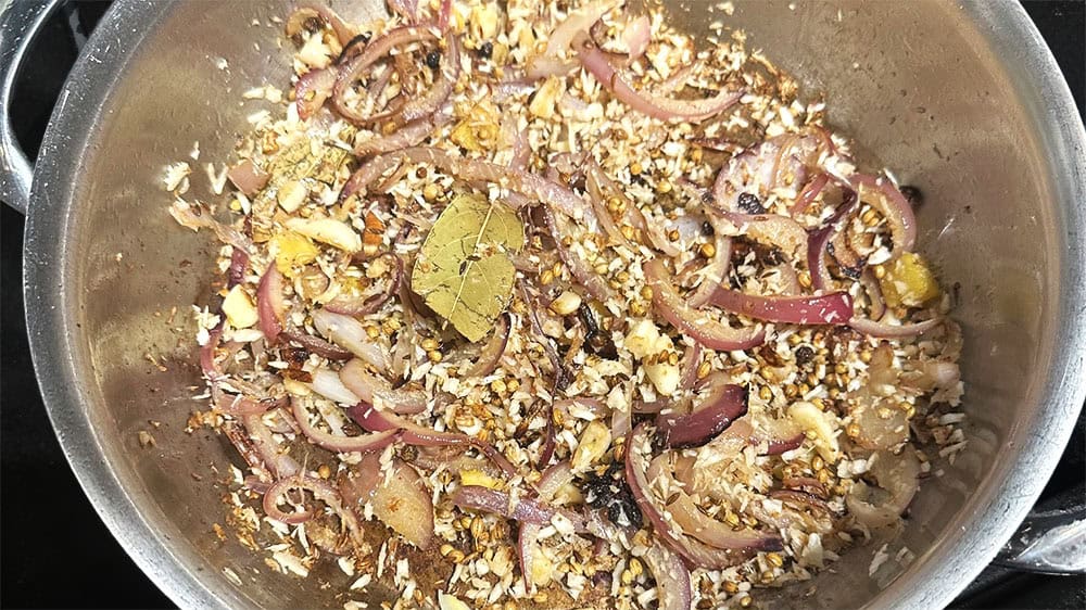 Toasted spices, coconut and onions for misal.