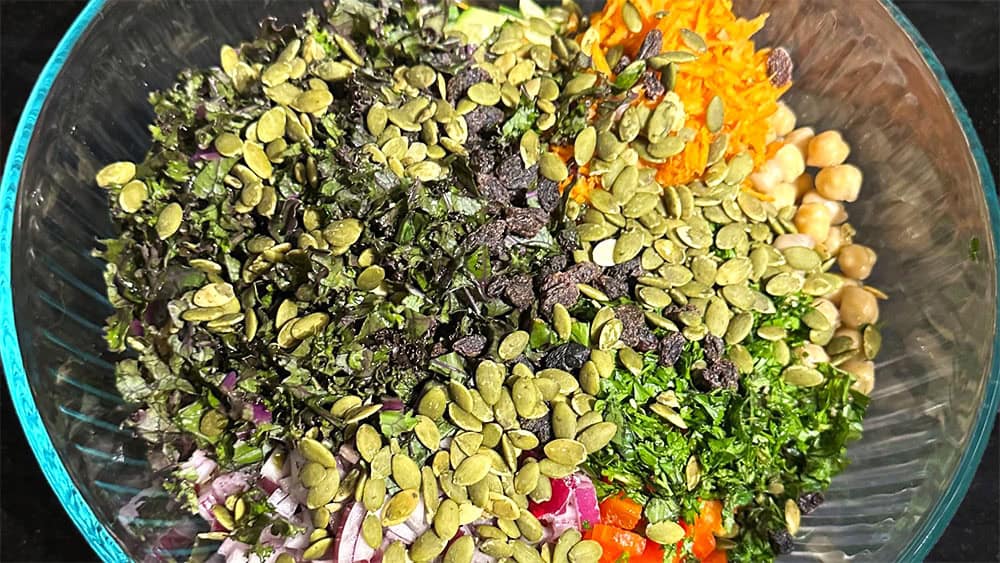 Salad ingredients in bowl before mixing.