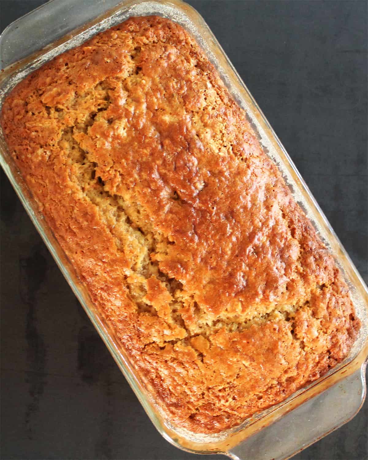 Watermelon rind bread in glass loaf pan.