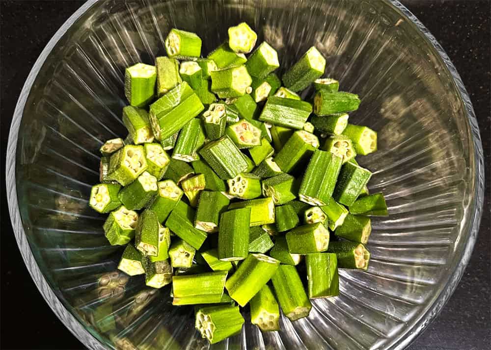 Chopped okra in bowl.