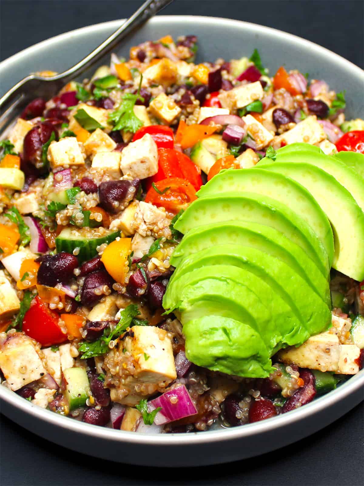 Kidney beans salad in bowl with avocado.