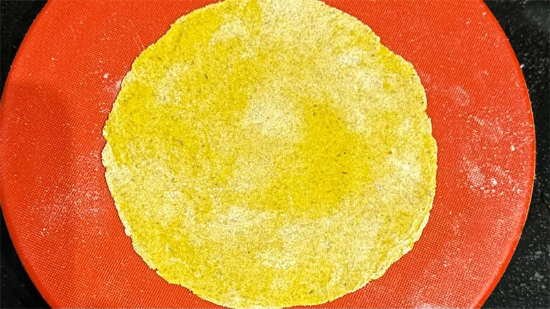 Paratha after rolling and shaping.