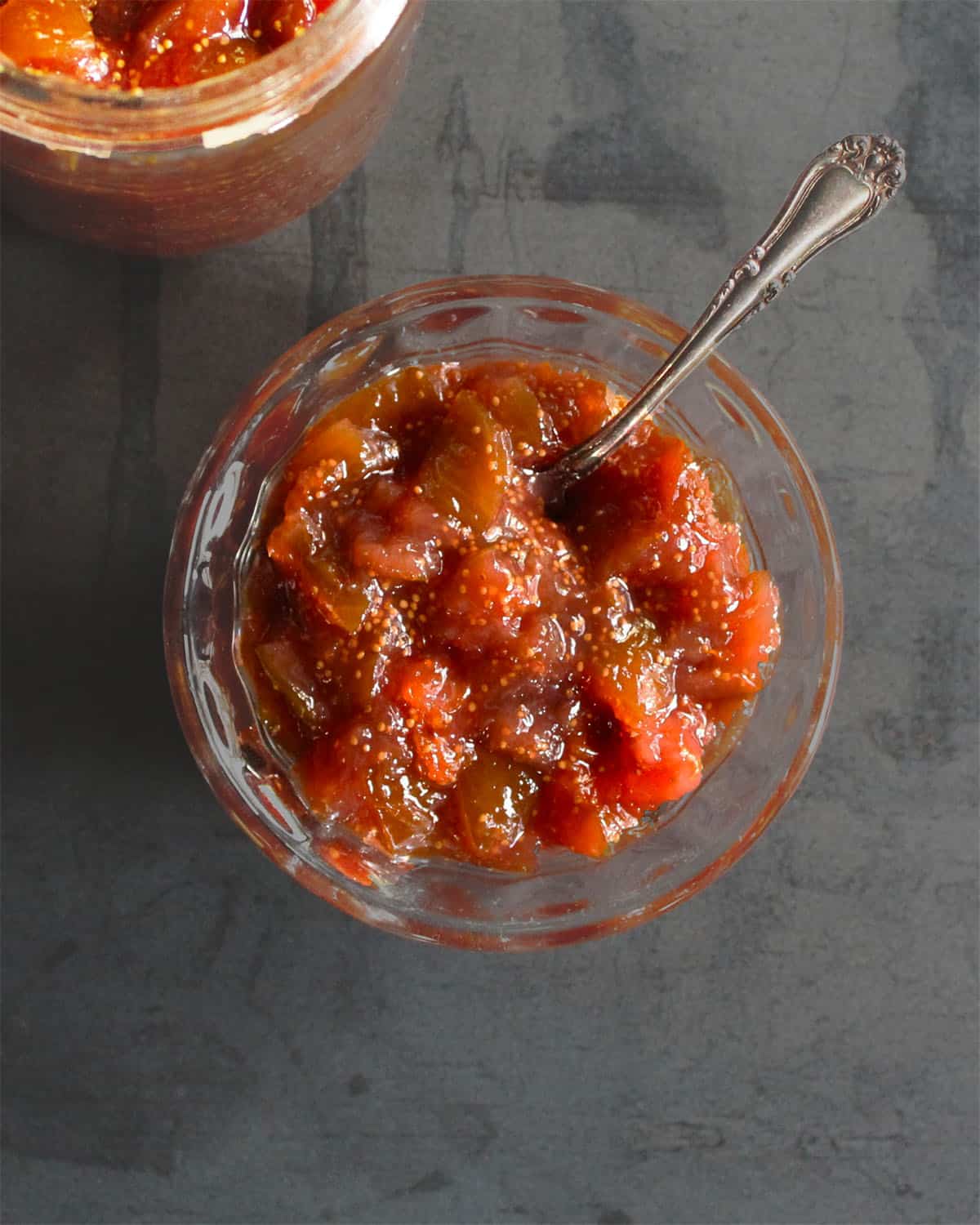 Fresh fig jam in a bowl with spoon.